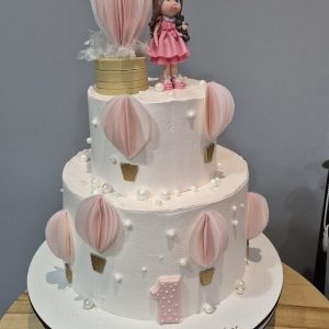 Tort aniversar etajeră 1 an cu figurină păpușă, baloane parasute roz, cremă de brânză, perle aurii, Emys Cakes