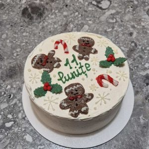 Bento „11 lunite” cu omuleți de turtă dulce, bastonașe roșii-albe, frunze verzi și fulgi, tematic Crăciun, 660-700g de la Emys Cakes