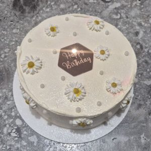 Bento „Happy Birthday” cu margarete galbene pe cremă albă sidefată roz, hexagoane bronz „Happy Birthday”, 660-700g de la Emys Cakes